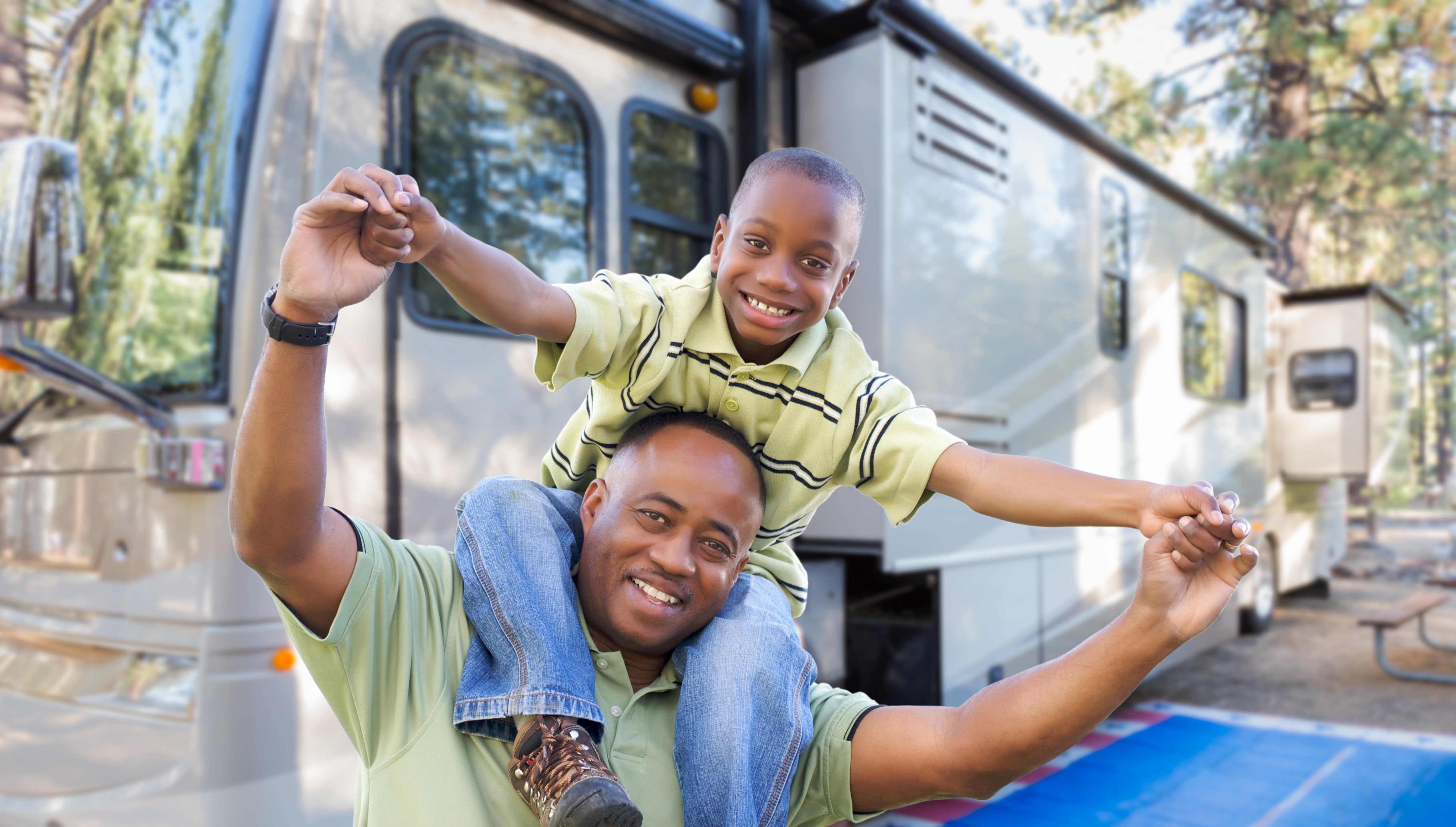 Father and Son with RV